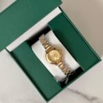 ساعة سيراميك ذهبي وفضي