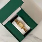 ساعة سيراميك ذهبي